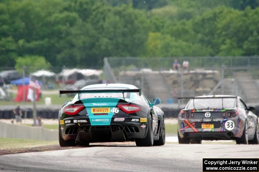 Nick Mancuso's Maserati GrandTurismo MC chases Dan Martinson's Ford Mustang Boss 302