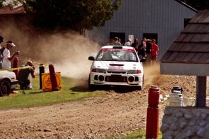 Tim Paterson / Scott Ferguson Mitsubishi Lancer Evo IV at the finish of SS1, Mexico Rec.