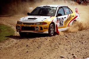 Keith Townsend / Ian McEwen Mitsubishi Lancer Evo IV at the finish of SS1, Mexico Rec.