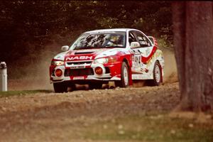 Noel Nash / Bernard Farrell Mitsubishi Lancer Evo IV at the finish of SS1, Mexico Rec.