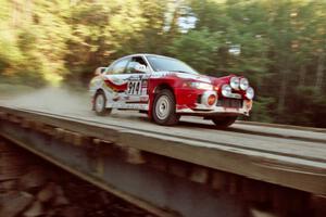 Noel Nash / Bernard Farrell Mitsubishi Lancer Evo IV on SS3, E. Town East.