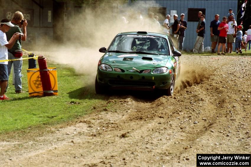 Tad Ohtake / Martin Dapot Ford Escort ZX2 at the finish of SS1, Mexico Rec.