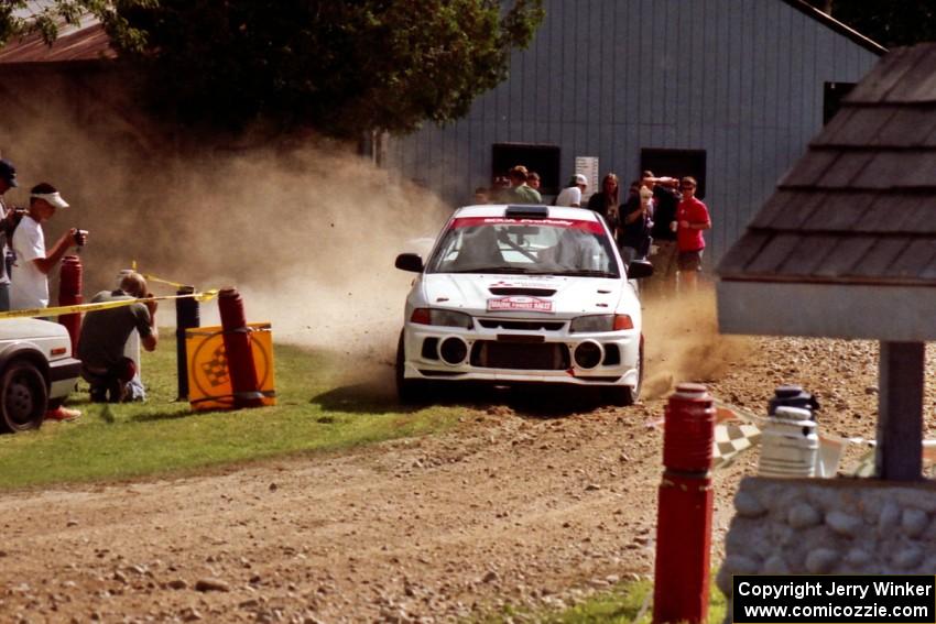 Tim Paterson / Scott Ferguson Mitsubishi Lancer Evo IV at the finish of SS1, Mexico Rec.