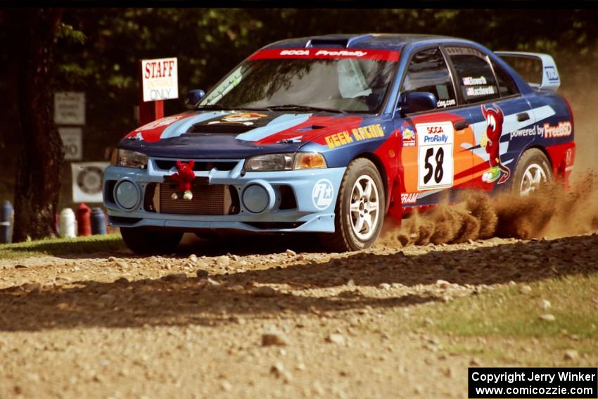 Alec Ellsworth /	Steve Kaczkowski Mitsubishi Lancer Evo IV at the finish of SS1, Mexico Rec.