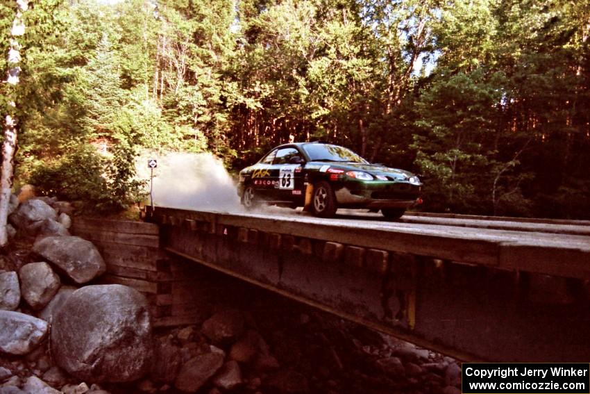 Tad Ohtake / Martin Dapot Ford Escort ZX2 on SS3, E. Town East.