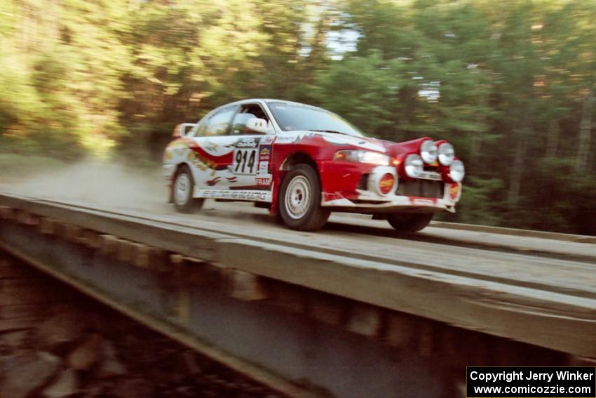 Noel Nash / Bernard Farrell Mitsubishi Lancer Evo IV on SS3, E. Town East.