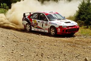 Garen Shrader / Michael Fennell Mitsubishi Lancer Evo IV on SS6, Parmachenee East.