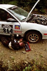 Juliette Rice / Bryan Gwisc Dodge Neon stops to remove their skidplate on SS6, Parmachenee East.