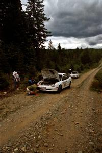 Juliette Rice / Bryan Gwisc Dodge Neon and Max Stratton / Charles Theocles Porsche 911 both stopped for repairs on SS6.