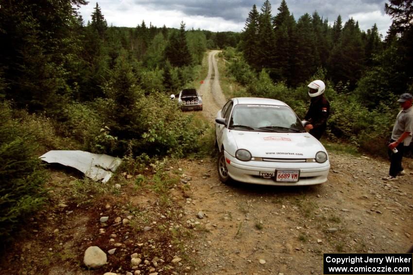 Juliette Rice / Bryan Gwisc Dodge Neon about to resume after removing the skidplate on SS6, Parmachenee East.