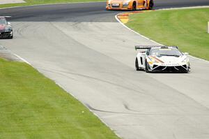 Tomas Enge's Lamborghini Gallardo GT3 FL2, Ryan Dalziel's Porsche 911 GT3R and Mike Skeen's Audi R8 LMS Ultra