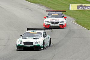 Butch Leitzinger's Bentley Continental GT3 and Peter Cunningham's Acura TLX-GT
