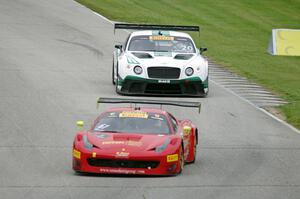 Olivier Beretta's Ferrari 458 GT3 Italia and Butch Leitzinger's Bentley Continental GT3