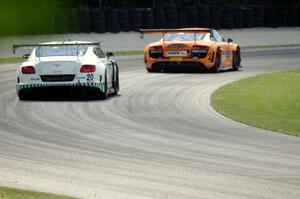 Butch Leitzinger's Bentley Continental GT3 chases Mike Skeen's Audi R8 LMS Ultra
