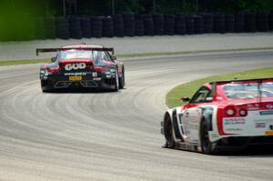 Michael Lewis' Porsche 911 GT3R and Bryan Heitkotter's Nissan GT-R GT3