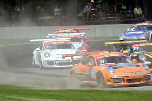 GT3 Cup cars battle at turn 6 after the re-start.