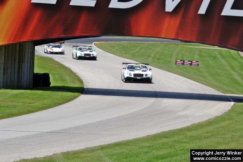Butch Leitzinger's Bentley Continental GT3, Chris Dyson's Bentley Continental GT3 and Tomas Enge's Lamborghini Gallardo GT3 FL2 