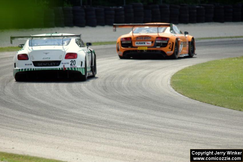 Butch Leitzinger's Bentley Continental GT3 chases Mike Skeen's Audi R8 LMS Ultra