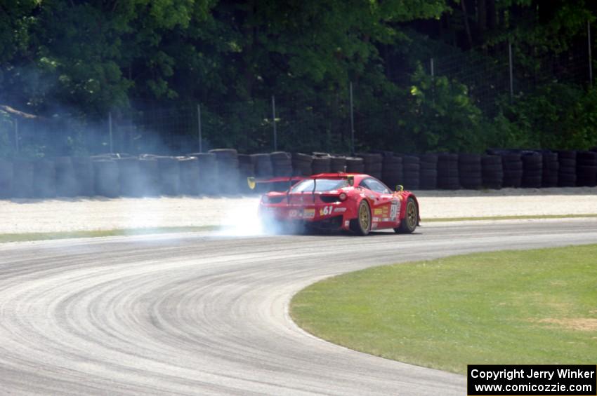 Olivier Beretta's Ferrari 458 GT3 Italia limps through the carousel