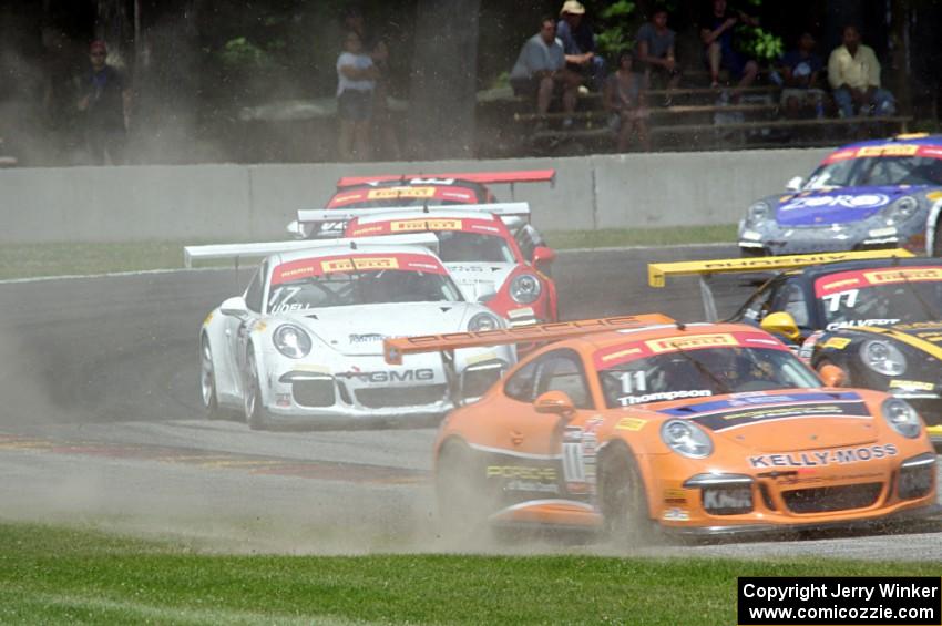 GT3 Cup cars battle at turn 6 after the re-start.