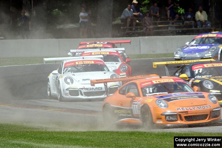 GT3 Cup cars battle at turn 6 after the re-start.