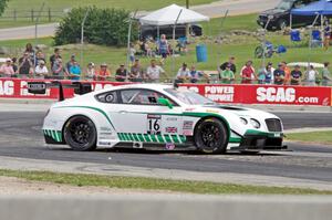 Chris Dyson's Bentley Continental GT3 stalls after spinning at turn 5.