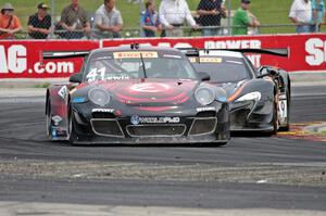 Michael Lewis' Porsche 911 GT3R and Kevin Estre's McLaren 650S GT3