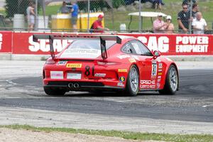 Victor Gomez's Porsche 911 GT3 Cup spins at turn 5.