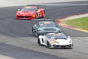 Tomas Enge's Lamborghini Gallardo GT3 FL2, James Davison's Nissan GT-R GT3 and Olivier Beretta's Ferrari 458 GT3 Italia