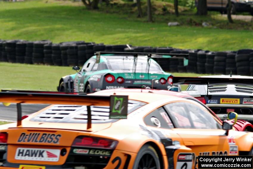 James Davison's Nissan GT-R GT3 leads Tomas Enge's Lamborghini Gallardo GT3 FL2 and Mike Skeen's Audi R8 LMS Ultra