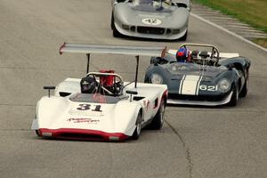 Michael Moss' Lola T-163, Tom Shelton's Lola T-70 Spyder and Farrell Preston's McLaren M1B