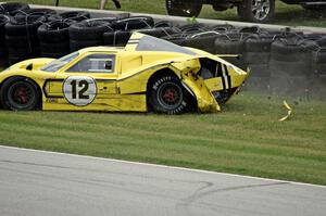 Gary Moore's Ford GT40 Mk. IV crashes at turn 7.