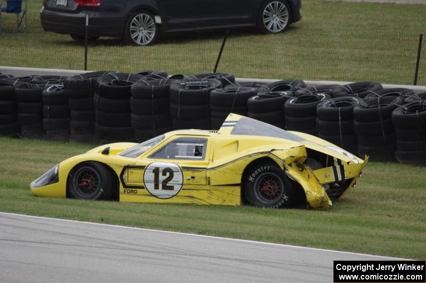 Gary Moore's Ford GT40 Mk. IV crashes at turn 7.