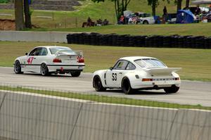 Patrick Jeffords' BMW M3 and Tom Hedges' Porsche 911 RSR