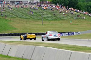Brian Morrison's Chevy Corvette and Harry McPherson's Ford Mustang Cobra-R