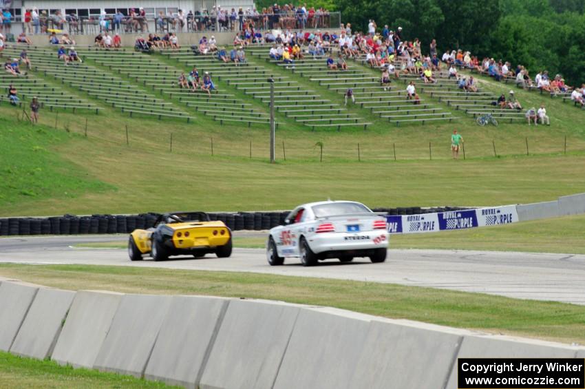 Brian Morrison's Chevy Corvette and Harry McPherson's Ford Mustang Cobra-R