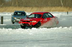 Brent Carlson's Subaru Impreza and Paul Wudarski's Subaru Legacy Wagon