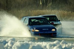 Steve Beeler's Honda Civic and Brad Johnson's VW Rabbit