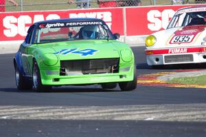 Rick Nichols' Datsun 240Z and Mark White's Porsche 911 Carrera