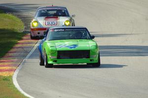 Rick Nichols' Datsun 240Z and Mark White's Porsche 911 Carrera