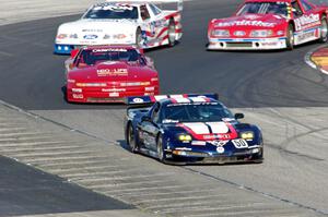 George Krass' Chevy Corvette C5R, Ike Keeler's Olds Cutlass, Scott Heider's Ford Mustang Cobra and Dick Howe's Ford Mustang