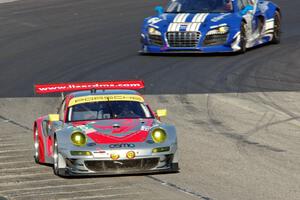 Tom Minnich's Porsche GT3 RSR and Jack Kachadurian's Audi R8 LMS