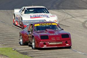 John Longwell's Dekon Chevy Monza and Kevin Head's Ford Mustang