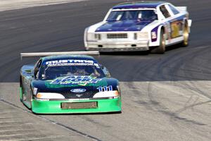 Randy Rupp's Ford Mustang and Shane Lewis' Chevy Nova