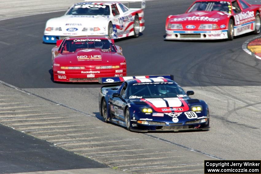 George Krass' Chevy Corvette C5R, Ike Keeler's Olds Cutlass, Scott Heider's Ford Mustang Cobra and Dick Howe's Ford Mustang