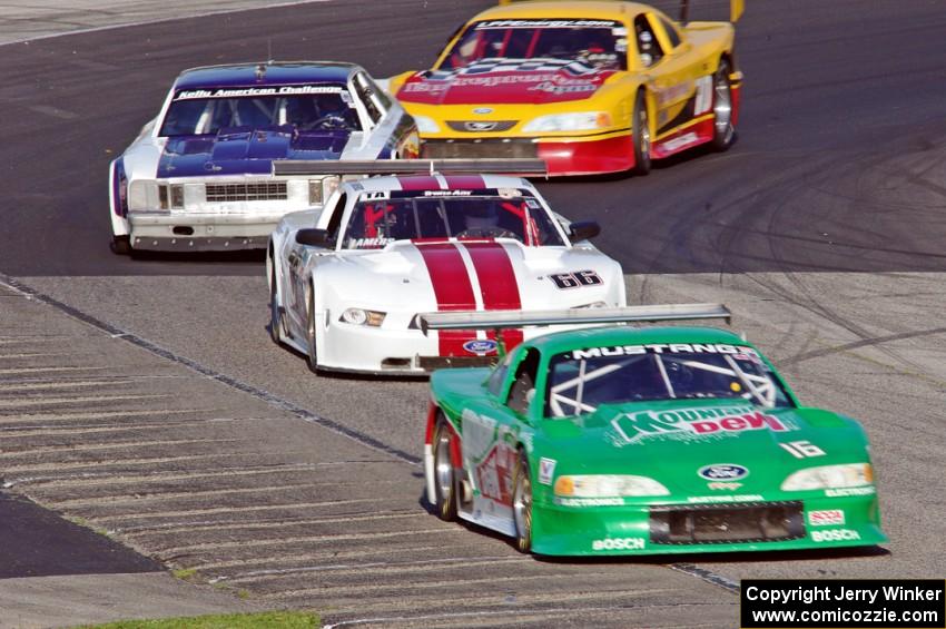 Colin Comer's Ford Mustang, Denny Lamers' Ford Mustang, Shane Lewis' Chevy Nova and Adam Rupp's Ford Mustang