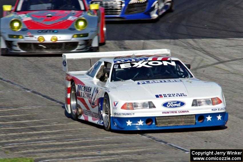 Scott Heider's Ford Mustang Cobra and Tom Minnich's Porsche GT3 RSR