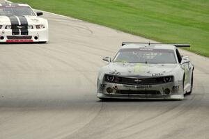 Adam Andretti's Chevy Camaro and Joe Ebben's Ford Mustang