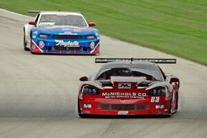 Amy Ruman's Chevy Corvette and Lawrence Loshak's Ford Mustang