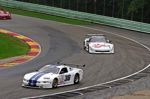 Cliff Ebben's Ford Mustang and Paul Fix's Chevy Corvette